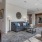 a living room with couches and a table